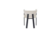 ALIA CHAIR WITH BLACK METAL LEGS AND BEIGE VELVET SEAT.