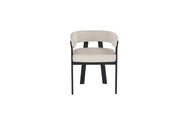 ALIA CHAIR WITH BLACK METAL LEGS AND BEIGE VELVET SEAT.