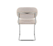 ARC CHAIR WITH CHROME LEGS AND ICED BROEN FABRIC UPHOLSTERY.