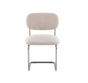 ARC CHAIR WITH CHROME LEGS AND ICED BROEN FABRIC UPHOLSTERY.
