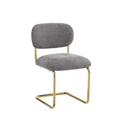 ARC CHAIR WITH GOLD LEGS AND ANTHRACITE MARBELLA FABRIC UPHOLSTERY.