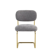 ARC CHAIR WITH GOLD LEGS AND ANTHRACITE MARBELLA FABRIC UPHOLSTERY.