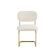 ARC CHAIR WITH GOLD LEGS AND BEIGE MARBELLA FABRIC UPHOLSTERY.