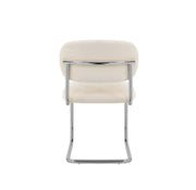 ARC CHAIR WITH SILVER LEGS AND BEIGE MARBELLA FABRIC UPHOLSTERY.