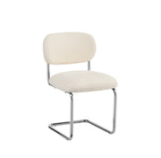 ARC CHAIR WITH SILVER LEGS AND BEIGE MARBELLA FABRIC UPHOLSTERY.