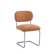 ARC CHAIR WITH SILVER LEGS AND TERRACOTTA MARBELLA FABRIC UPHOLSTERY.