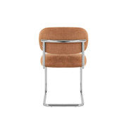 ARC CHAIR WITH SILVER LEGS AND TERRACOTTA MARBELLA FABRIC UPHOLSTERY.