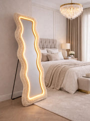 A MODREN FLOOR AND WALL MIRROR WITH 3 DIFFRENT LED LIGHTS WITH LIGHT BEIGE FUR BORDER. MEASUREMENT 60X160CM